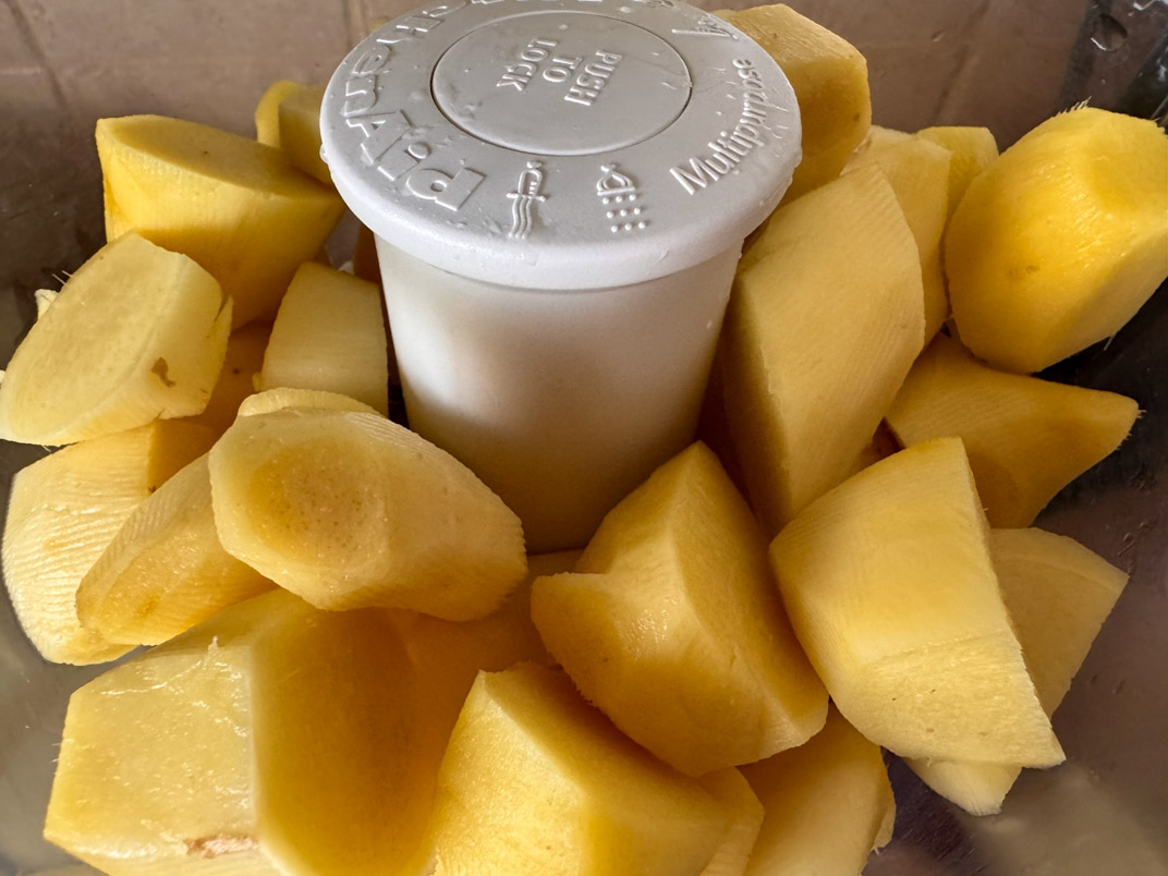 peeled ginger in a food processor