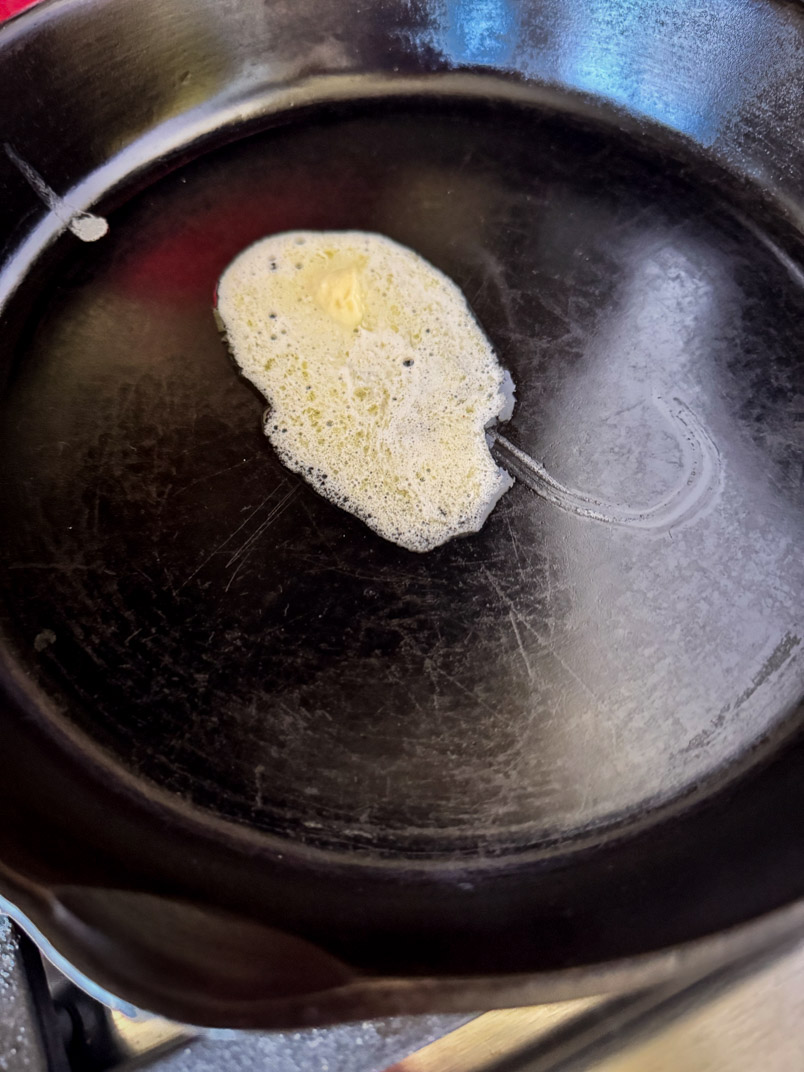 cultured butter in a cast-iron frying pan