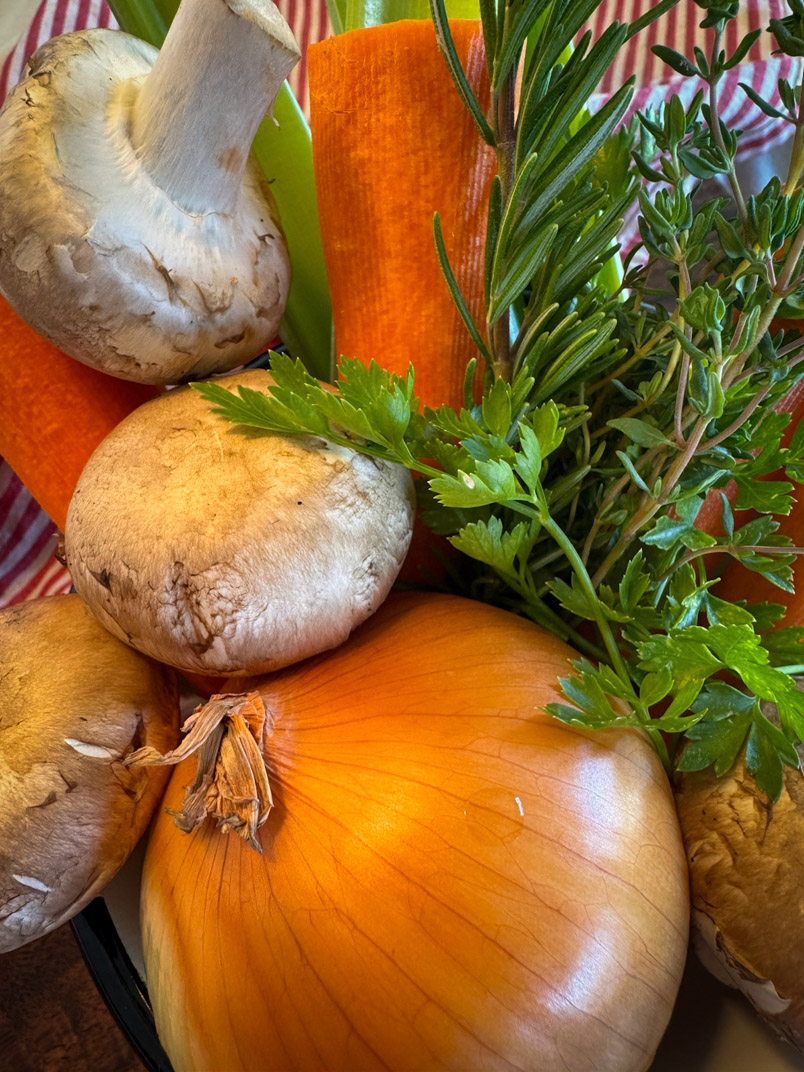 Make Homemade Chicken Broth from Thighs and Drumsticks, carrots, mushrooms, onion, and parsley. Make Homemade Chicken Broth from Thighs and Drumsticks, carrots, mushrooms, onion, and parsley.
