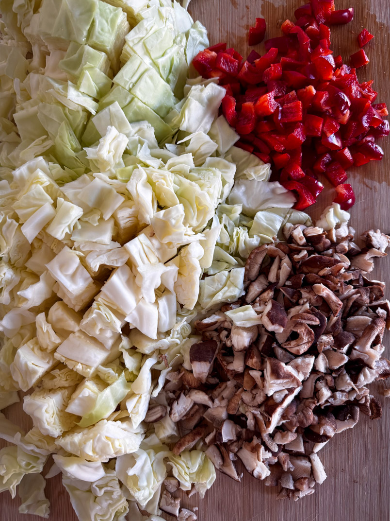 chopped cabbage, shiitake mushrooms, and red bell pepper