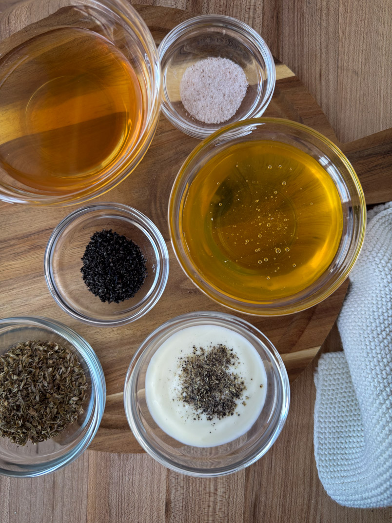 olive oil, honey, yogurt, apple cider vinegar, oregano, sea salt, and black seeds