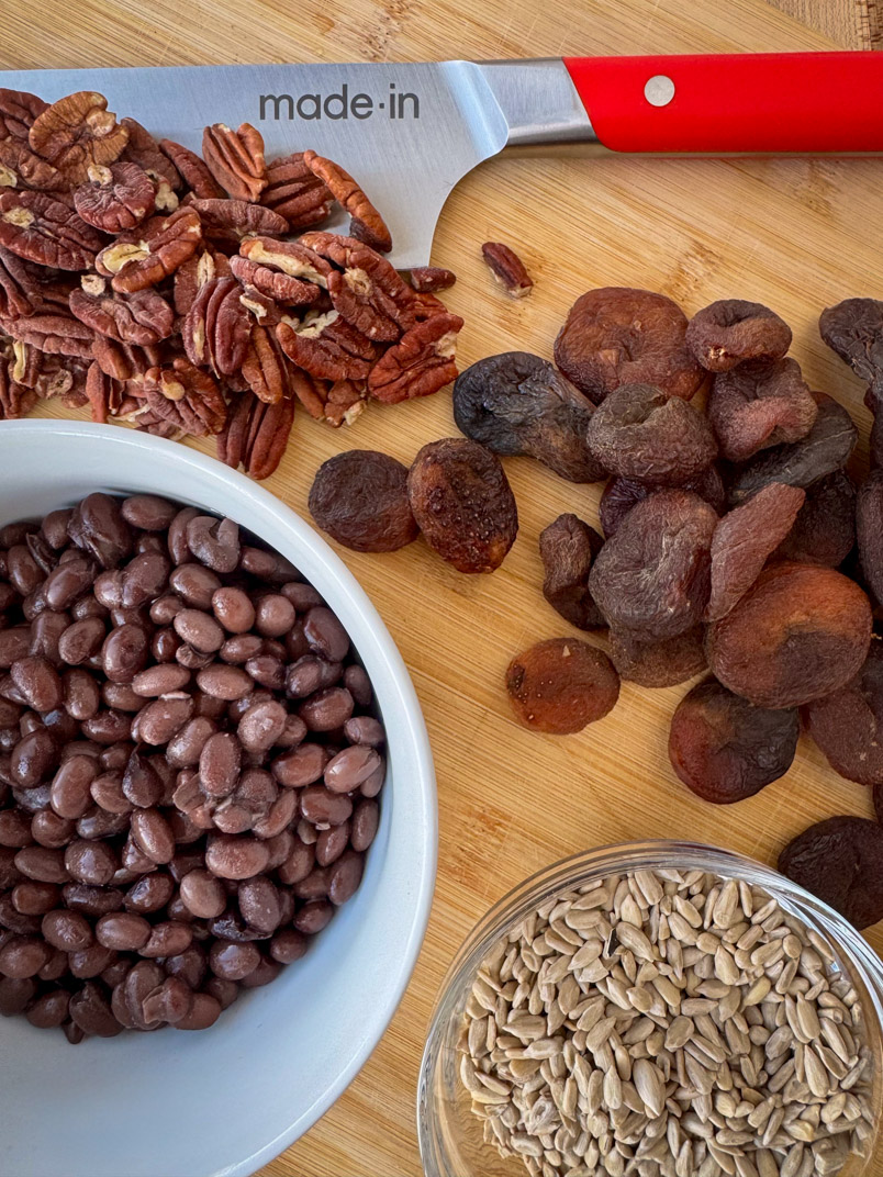 pecans, apricots, black beans, and sunflower seeds pecans, apricots, black beans, and sunflower seeds
