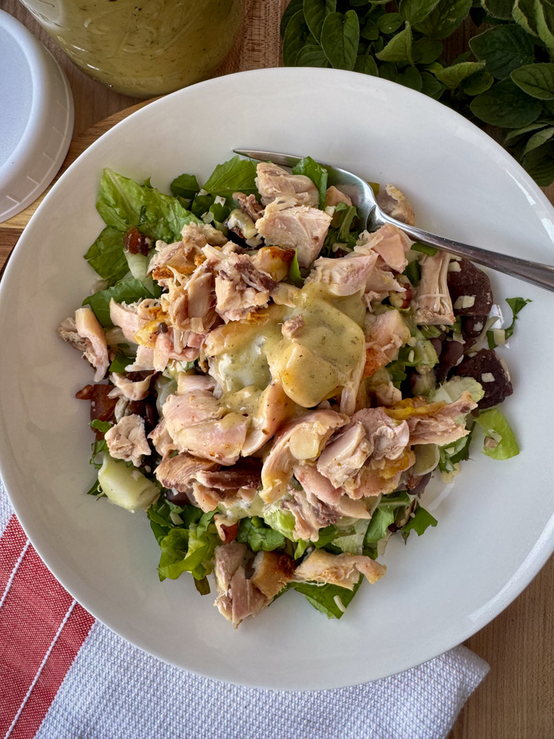 chopped romaine salad, arugula salad, and protein toppings chopped romaine salad, arugula salad, and protein toppings