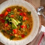 homemade chicken cilantro soup with rice and vegetables